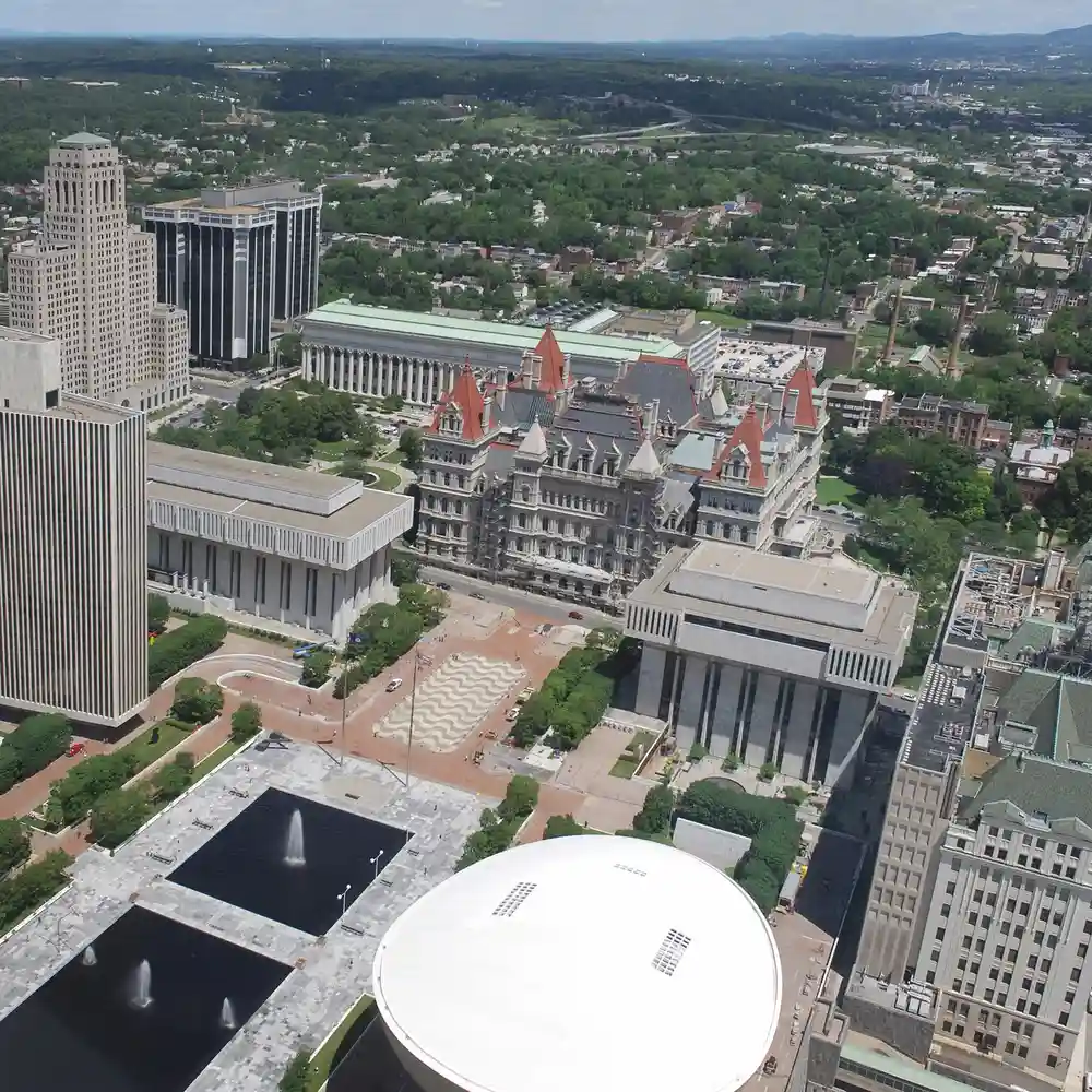 A view of the New York State capital, with the Empire Plaza government complex in the foreground, and the State House towards the back.