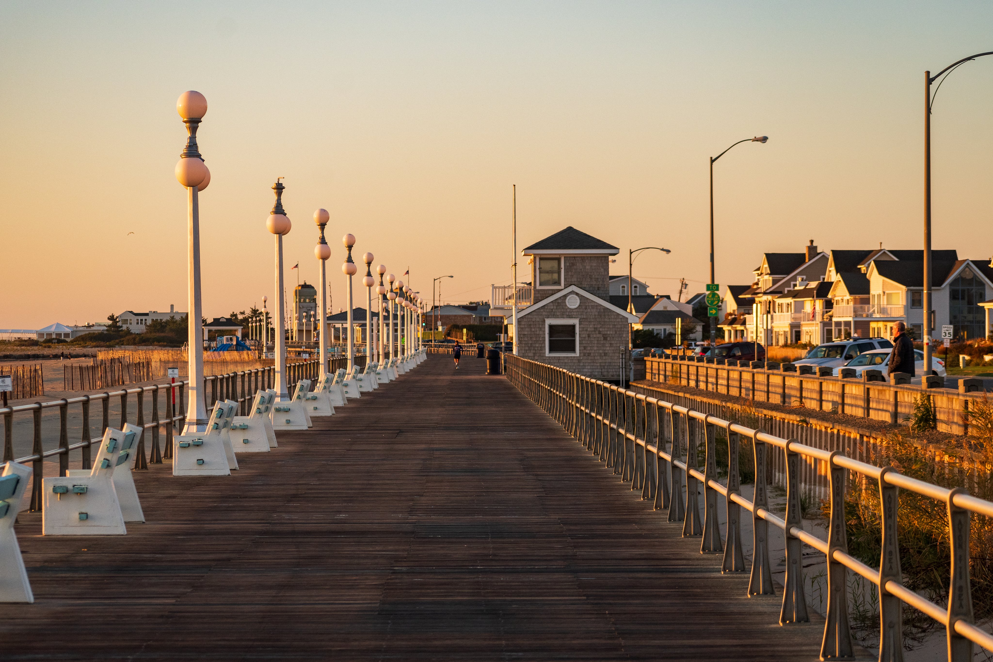 Avon By the Sea, New Jersey, USA - Golden hour sunrise on the jersey shore boardwalk in Avon by the Sea New Jersey