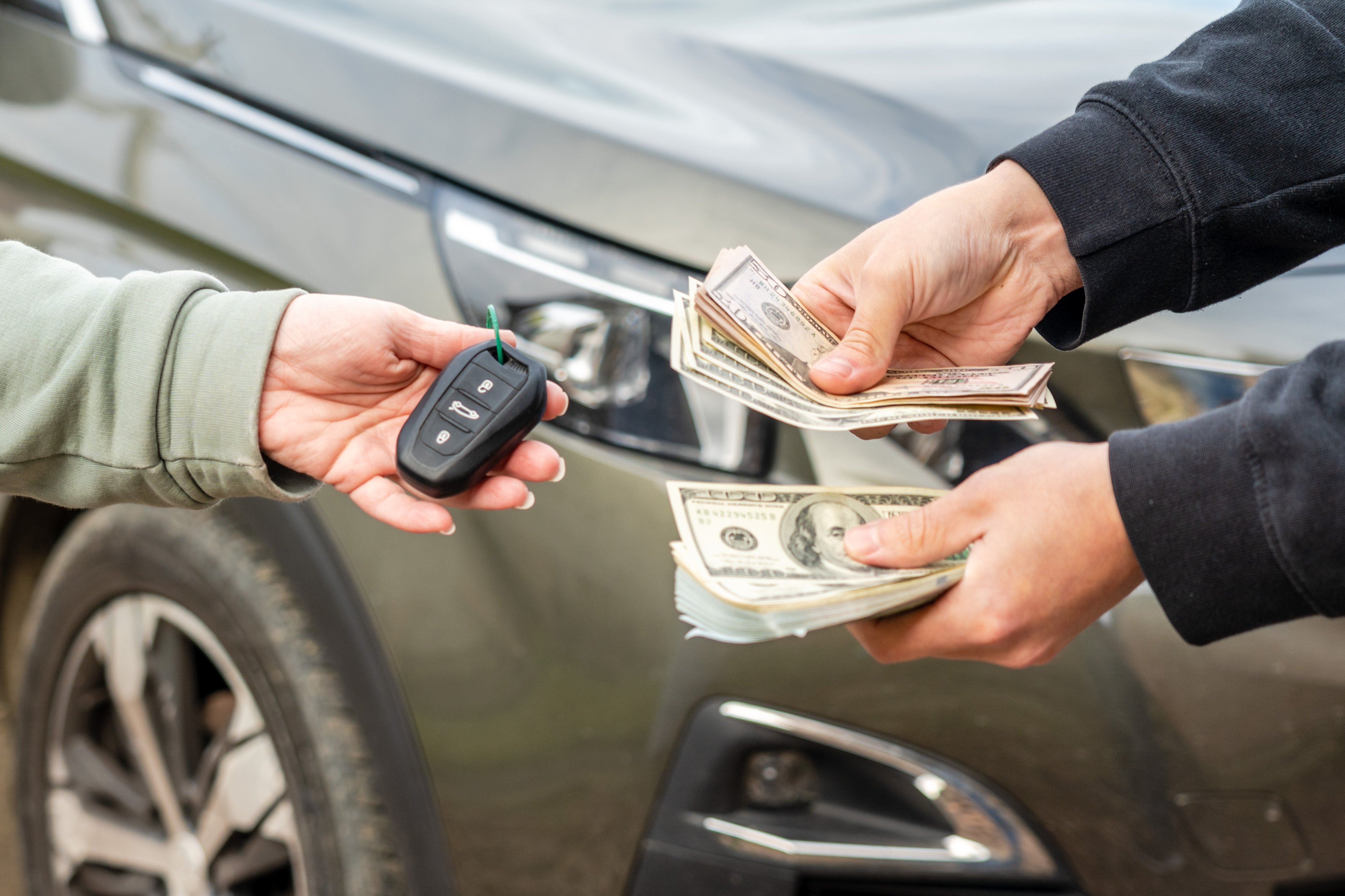 Exchange money and car keys