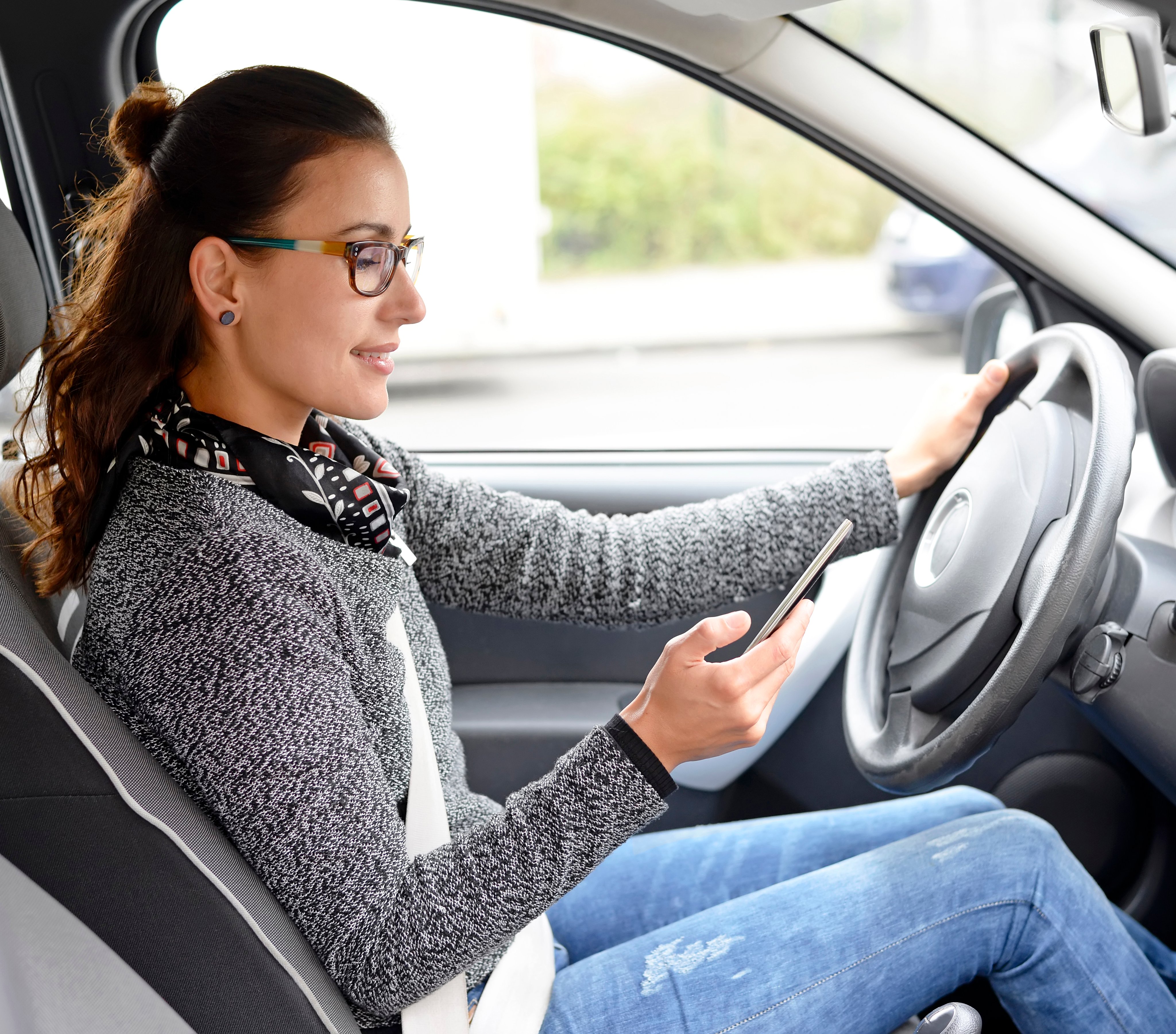 Girl texting while driving