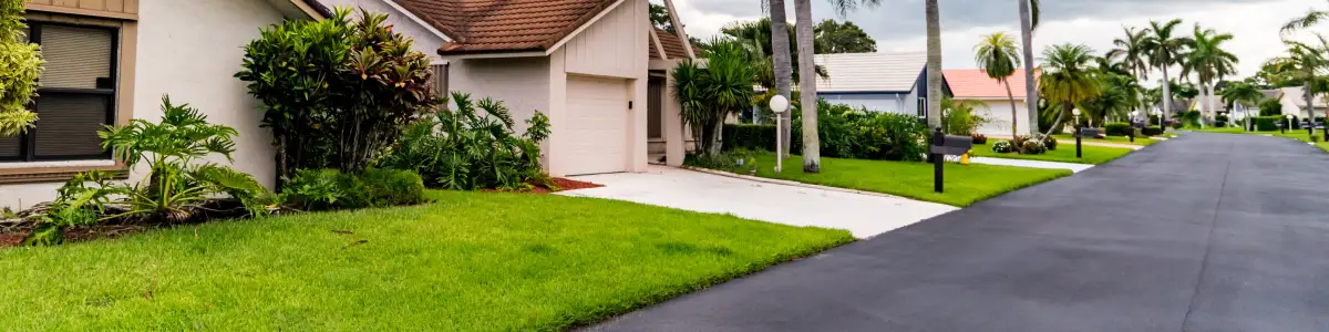 Florida suburbs with detached single family homes, middle class, well landscaped houses in planned community