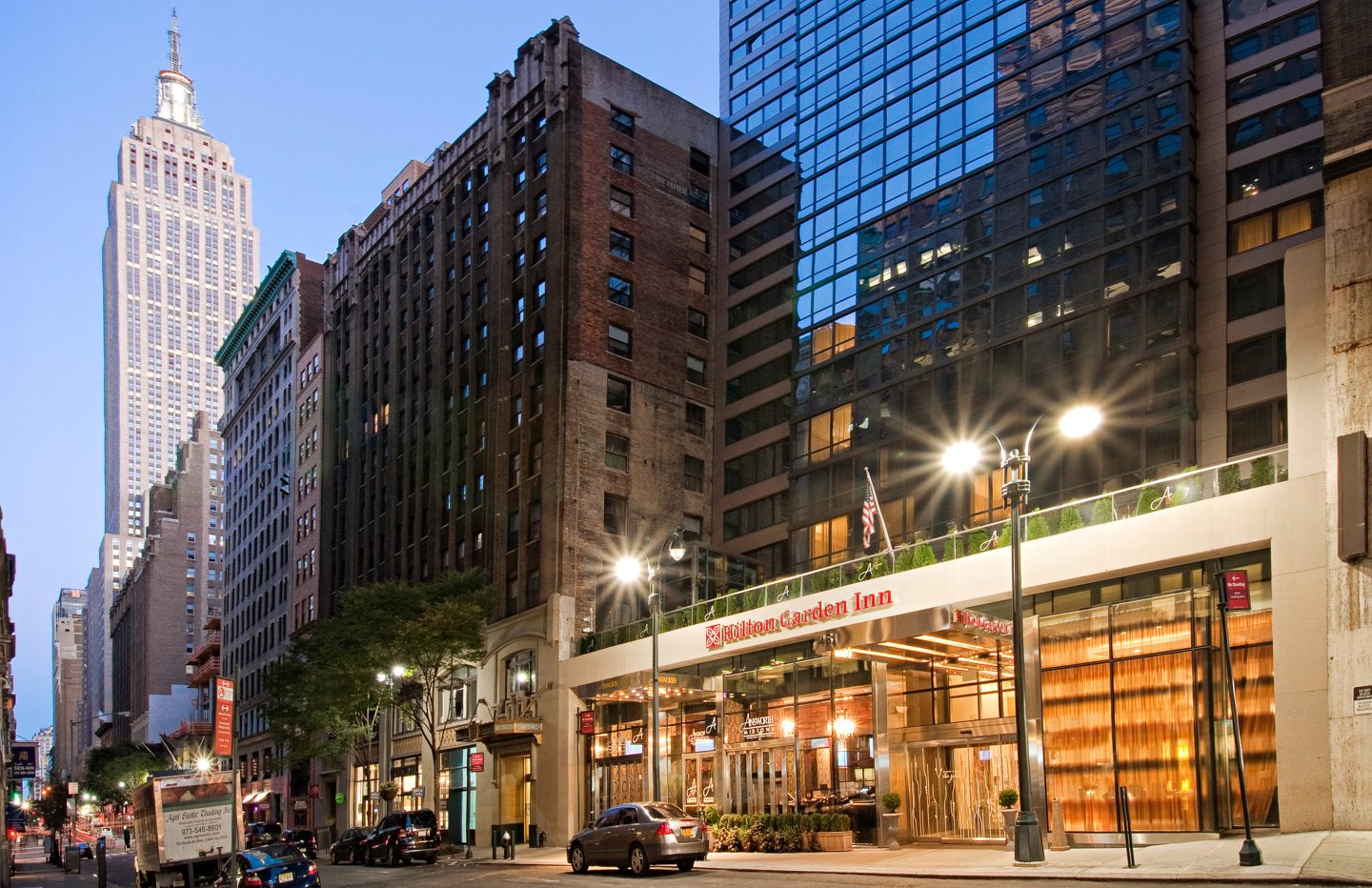 exterior at night of Hilton Garden Inn New York/Midtown Park Avenue