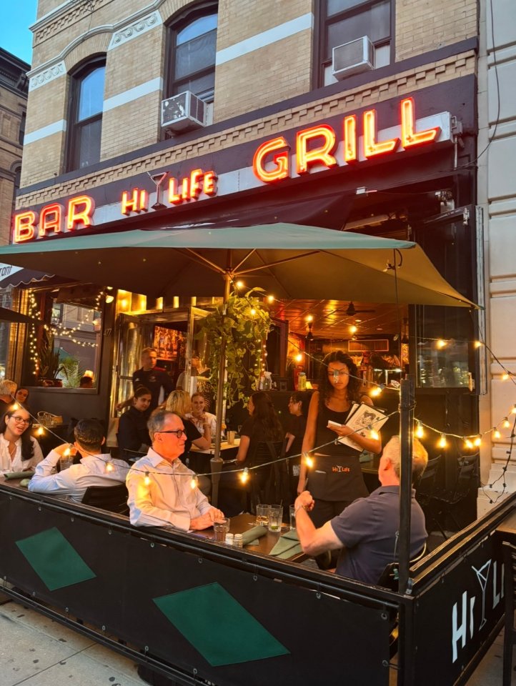 Sidewalk cafe seating at Hi-Life Bar & Grill