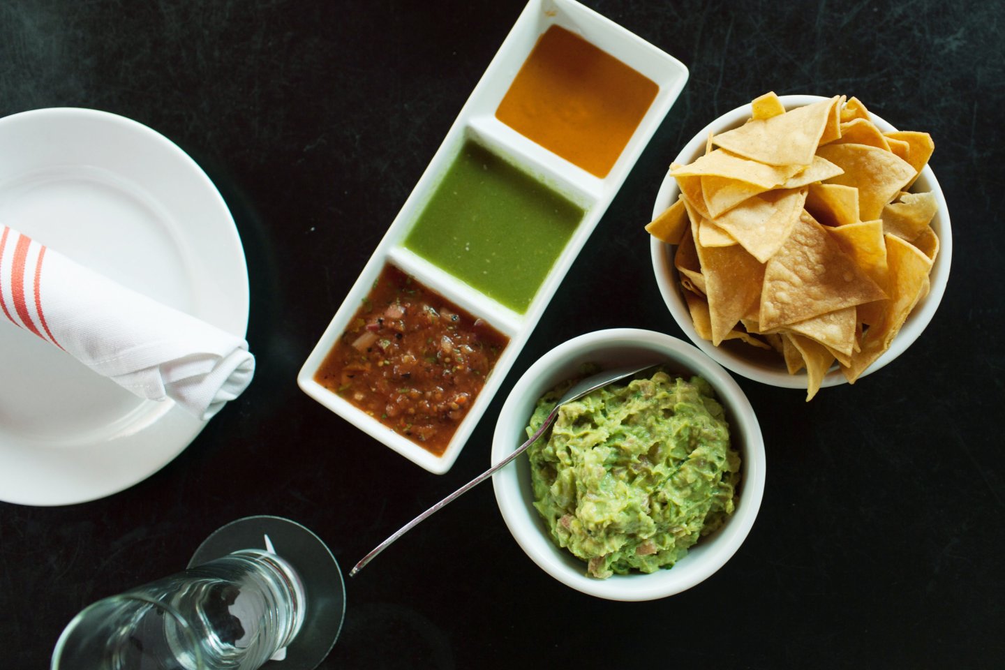 Guacamole and homemade chips and trio of salsas at El Toto Blanco in Manhattan