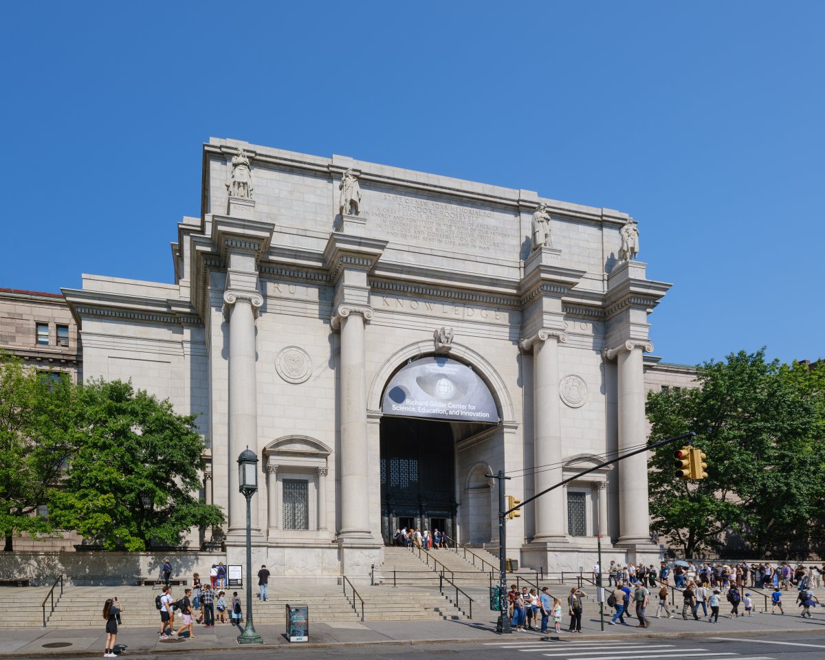 Wide summer time shot of the American Museum of Natural History's Central Park Entrance