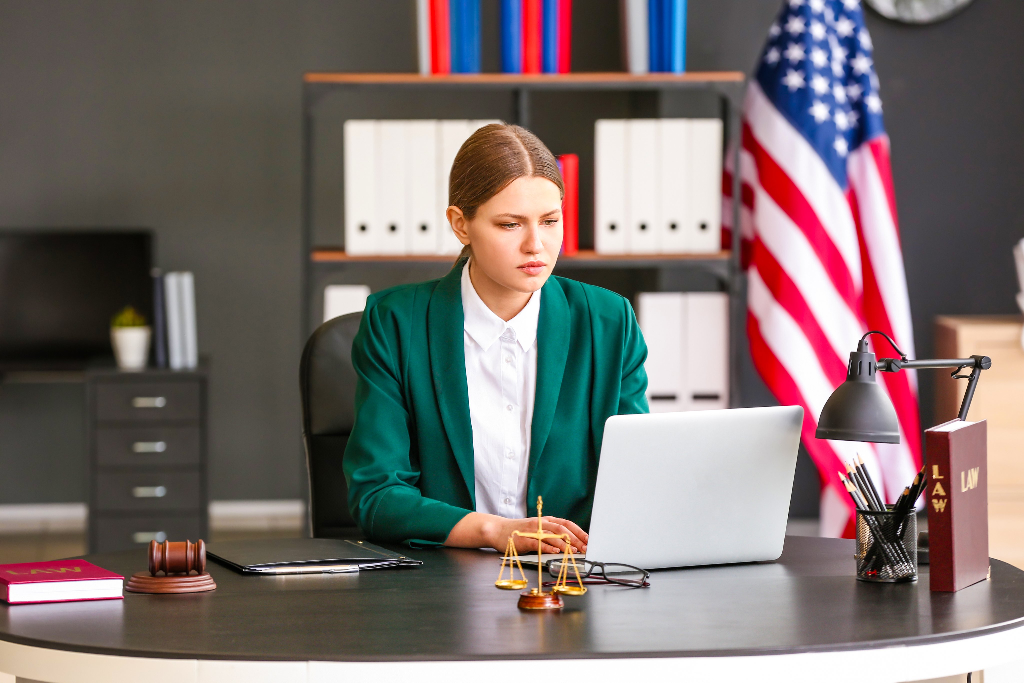 Female judge working at table in office