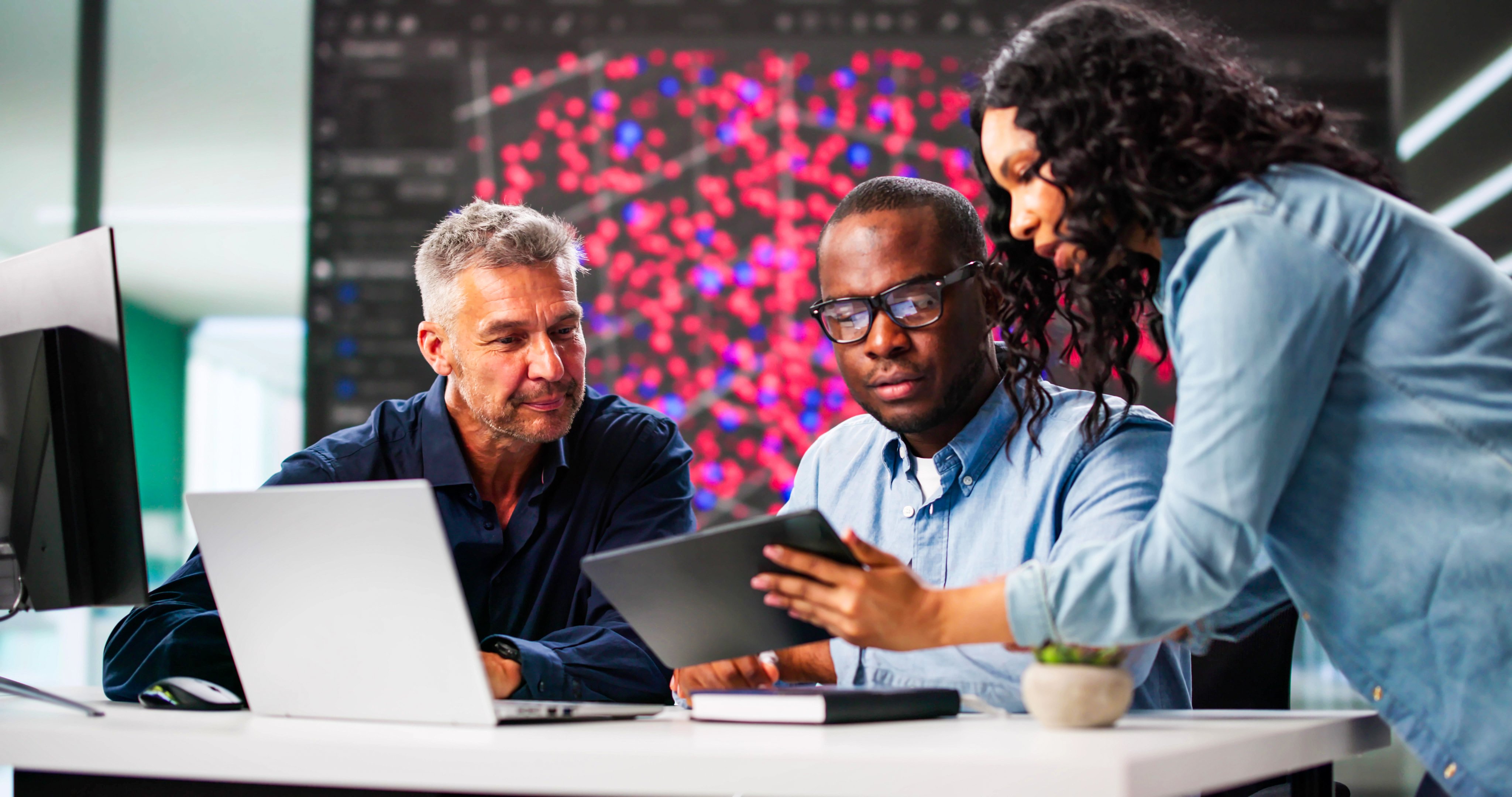 Black Engineer Using Laptop In Professional Cyber Security Team Office