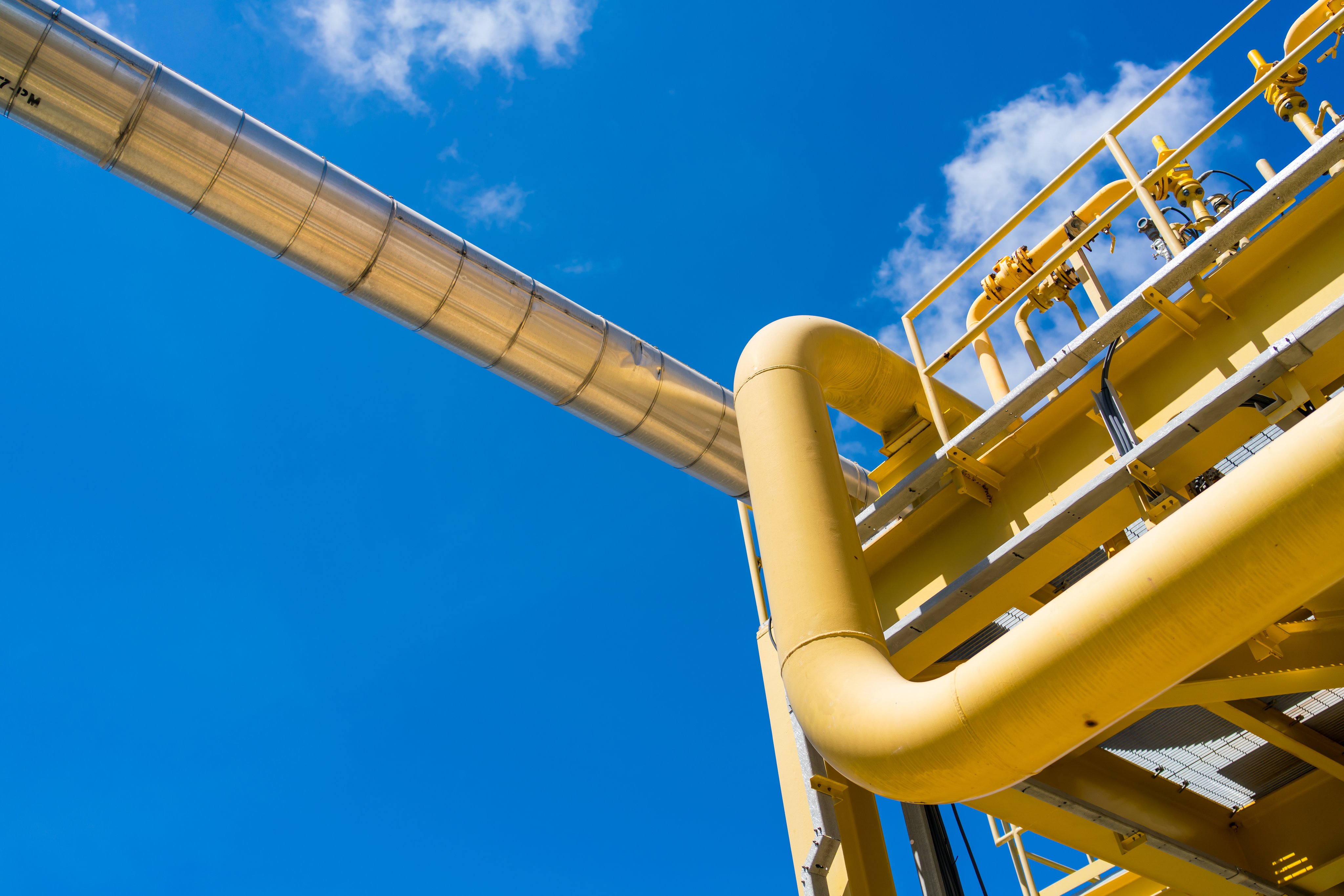 Oil and gas processing plant with pipe line valves.Steel pipelines and valves.Oil pipeline valves in the oil and gas industry.