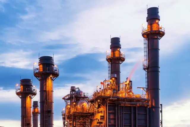 Glow light of petrochemical industry on sunset.