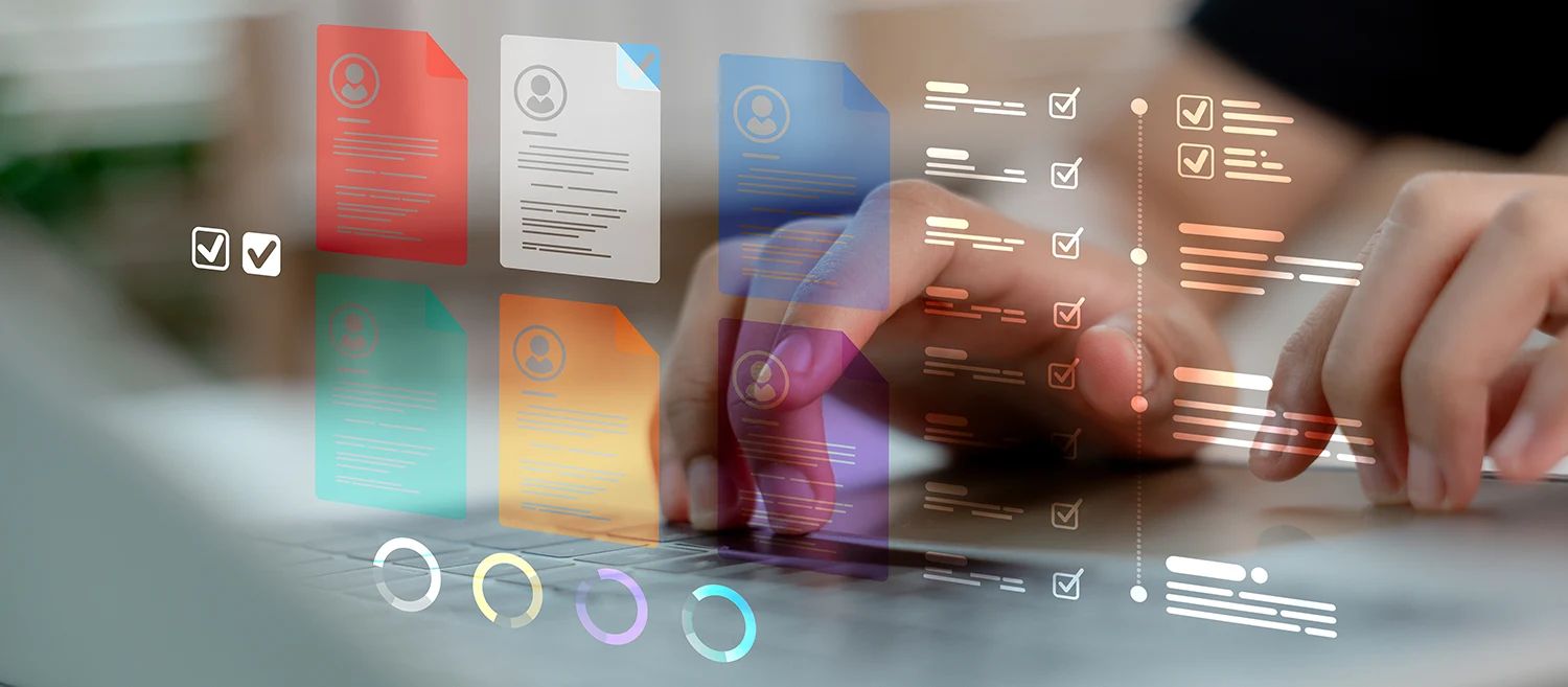 Hands typing on laptop with floating digital documents and checklist icons. Concept of online resume screening, recruitment process, task management, HR technology, and document workflow system.
