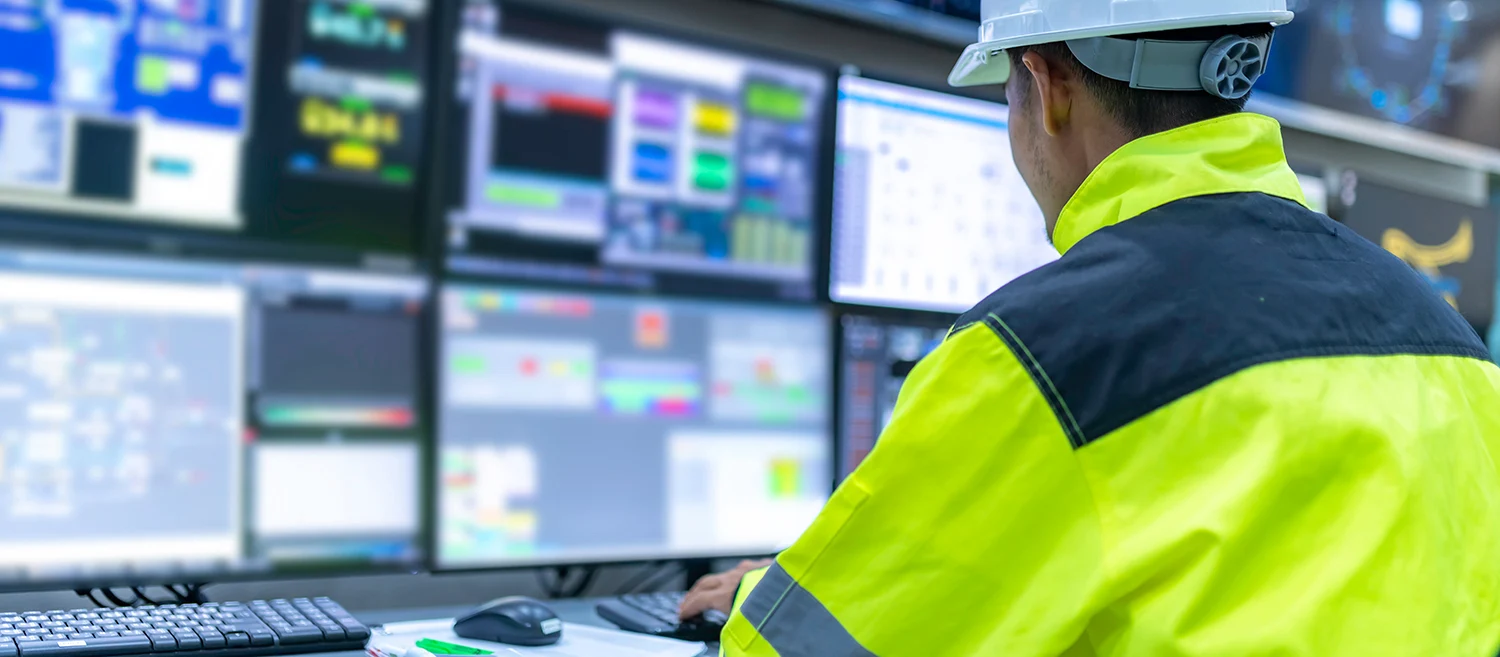 Engineer working at control room,Manager control system,Technician man monitoring program from a lot of monitor