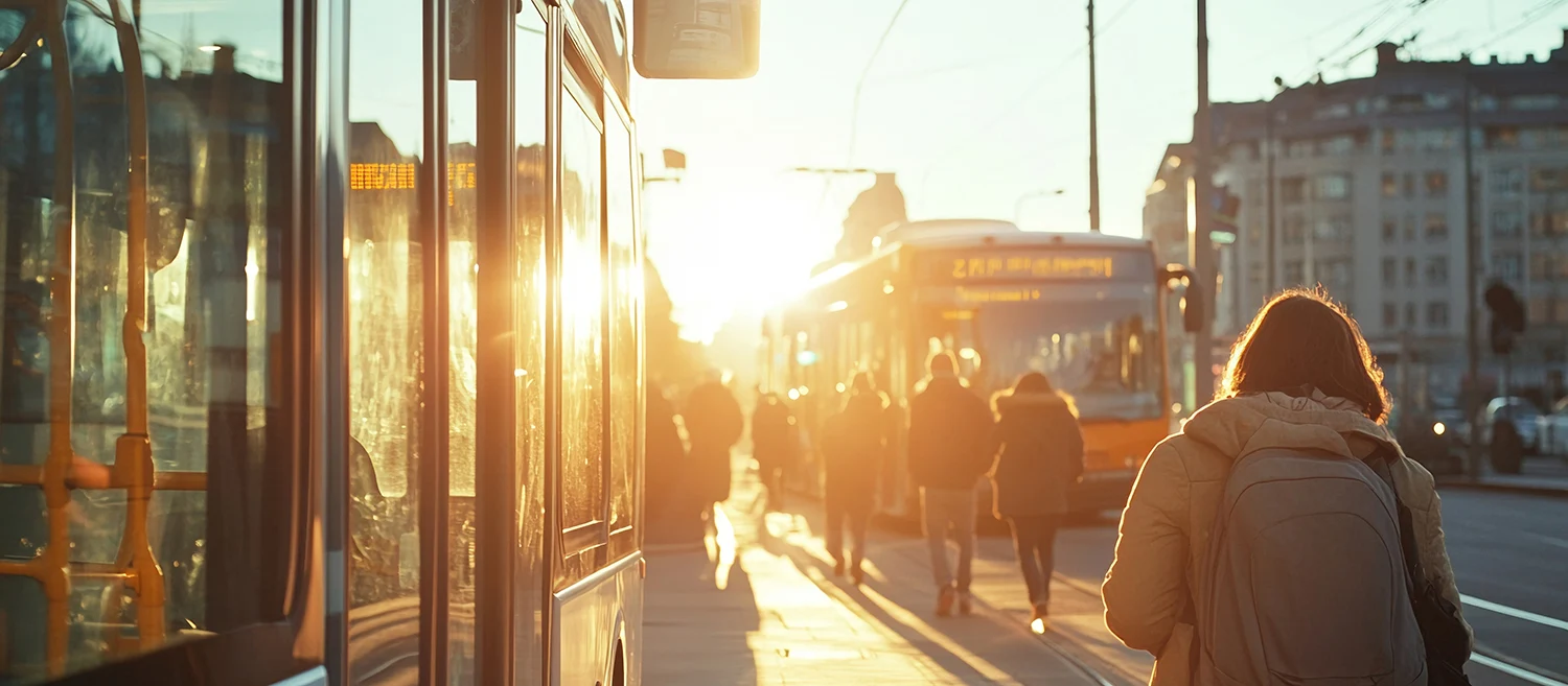 People boarding a bus with morning sunlight, Monday morning, commuting and routine