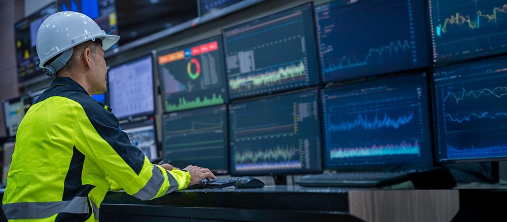 Engineer working at control room, Manager control system, Technician man monitoring program from a lot of monitor.
Specialist observes analytics dashboard,operator inspects digital interface