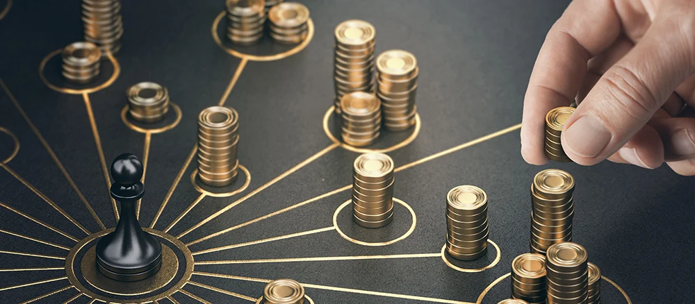 Man puting golden coins on a board representing multiple streams of income. Concept of multiplying sources of revenue. Composite image between a 3d illustration and a photography.