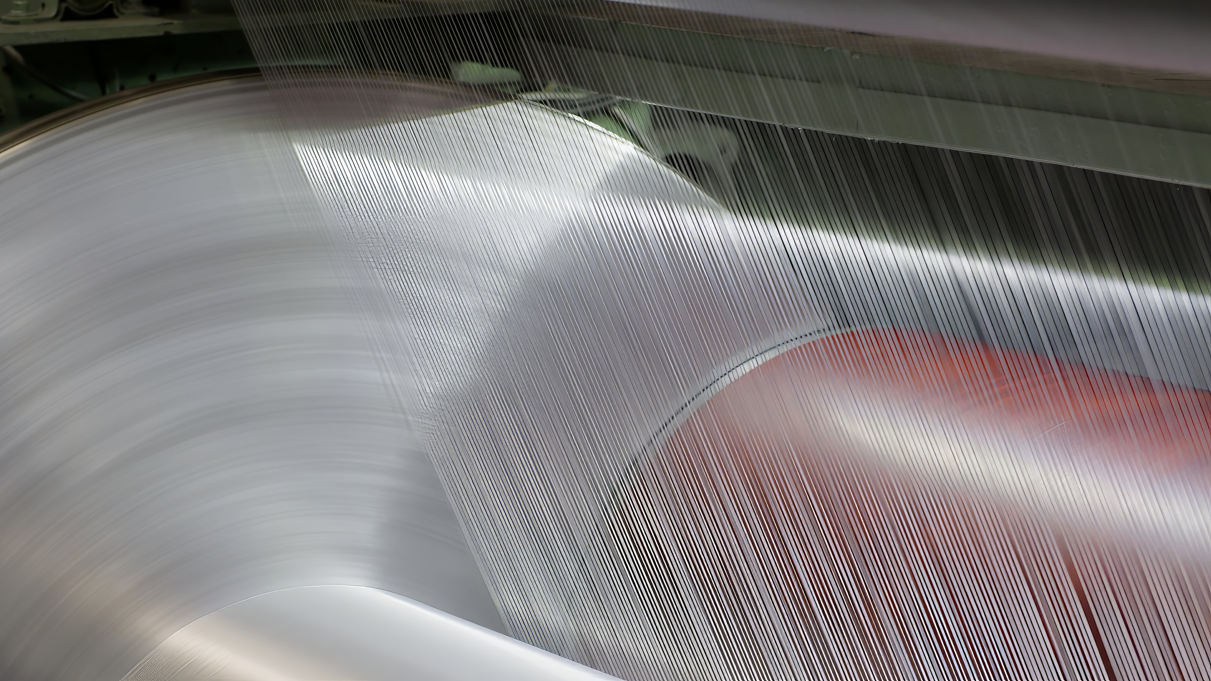 Photograph of Seaman Corporation products on rollers