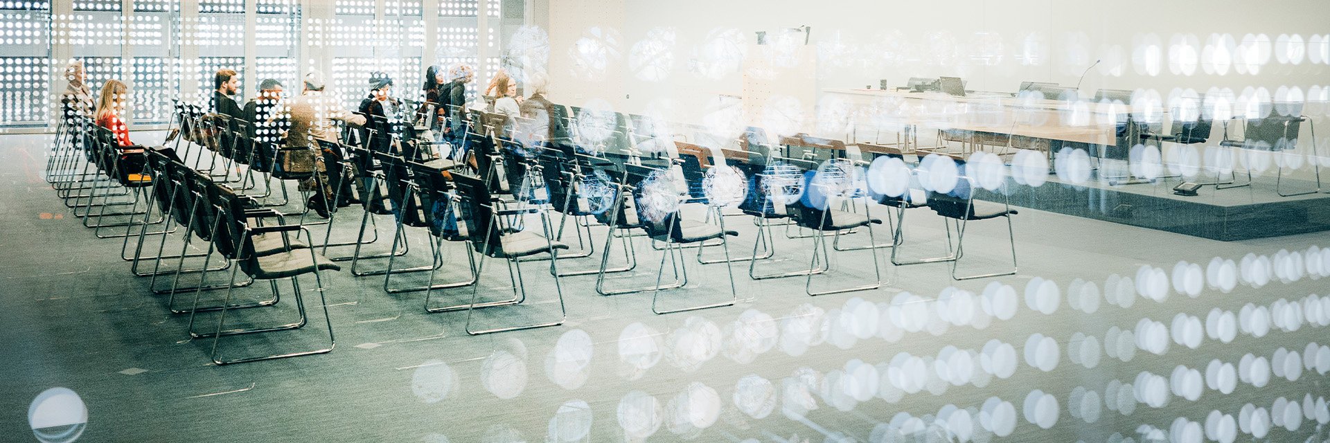 event-in-glass-room-with-chairs