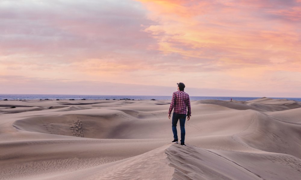 man-in-desert-dunes