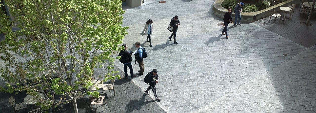 students-walking-campus-grounds