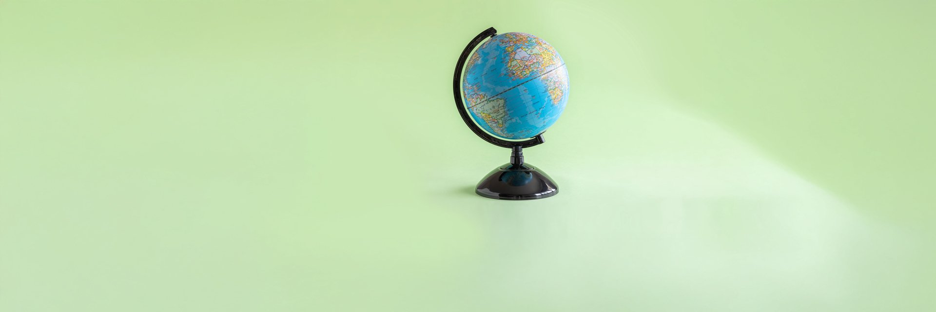 a globe on a green background