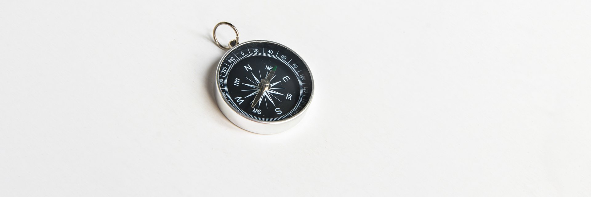 a compass on a white background