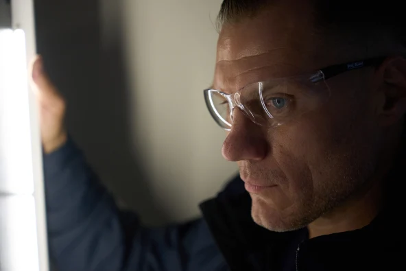 man performing an electrical panel upgrade