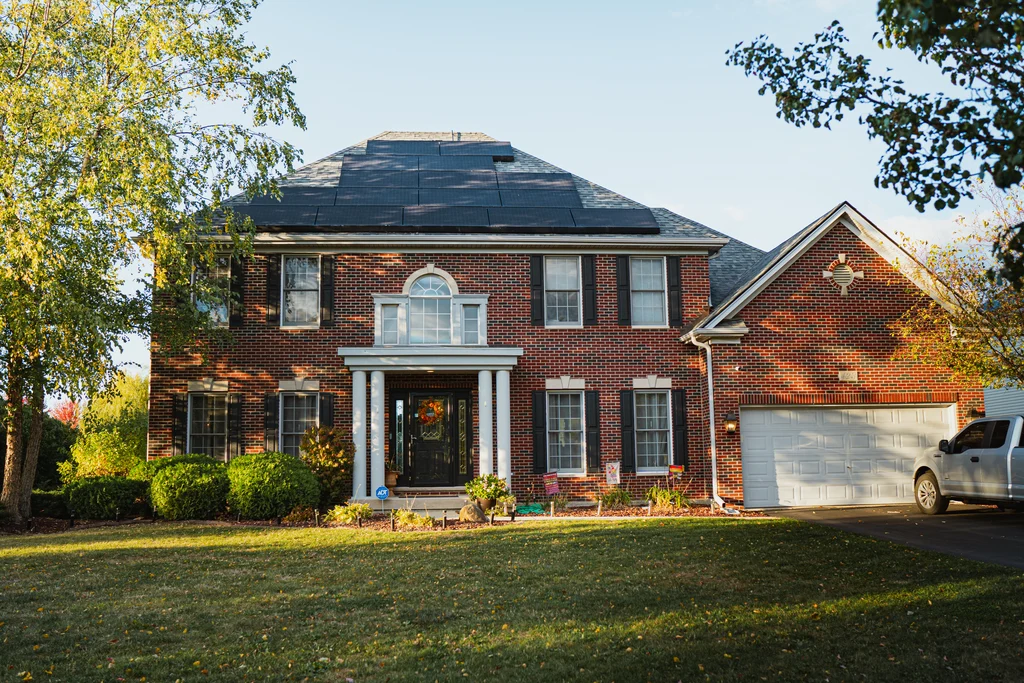 home with sunrun solar panels and battery storage