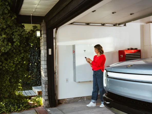 woman with sunrun home battery storage tesla powerwall 3