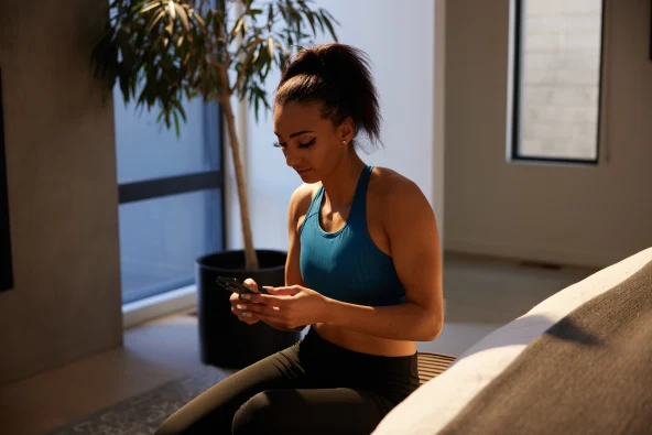 woman reading about renewable energy sources