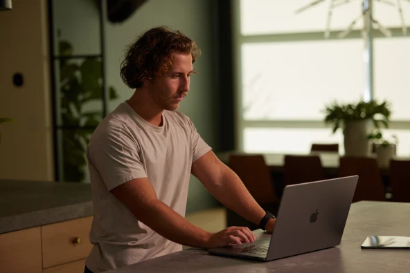 man reading about solar panel warranty