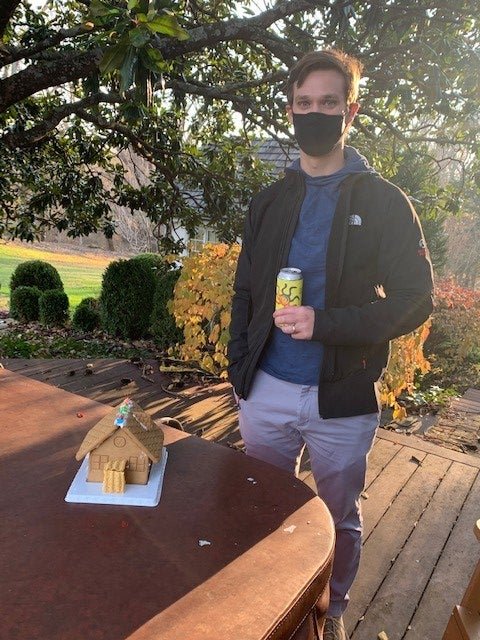 Resident Don building a gingerbread house
