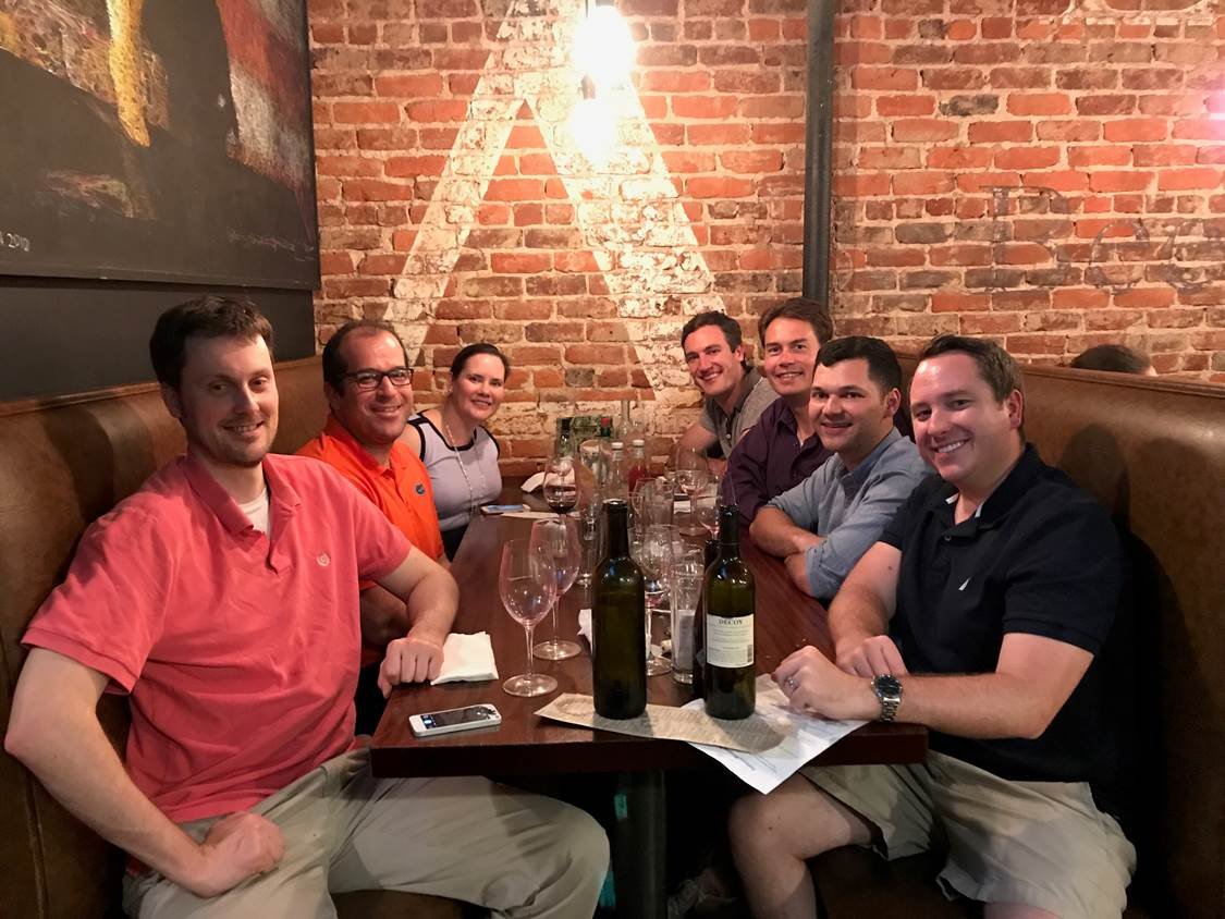 Former and Current Residents dining with Dr. Einsley-Marie Janowski at a recent conference