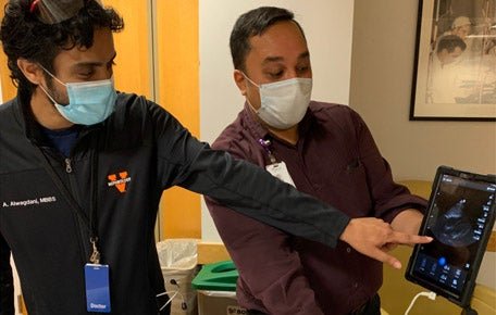 Dr. Anubhav Kumar, instructing fellow on the use of point of care ultrasound.
