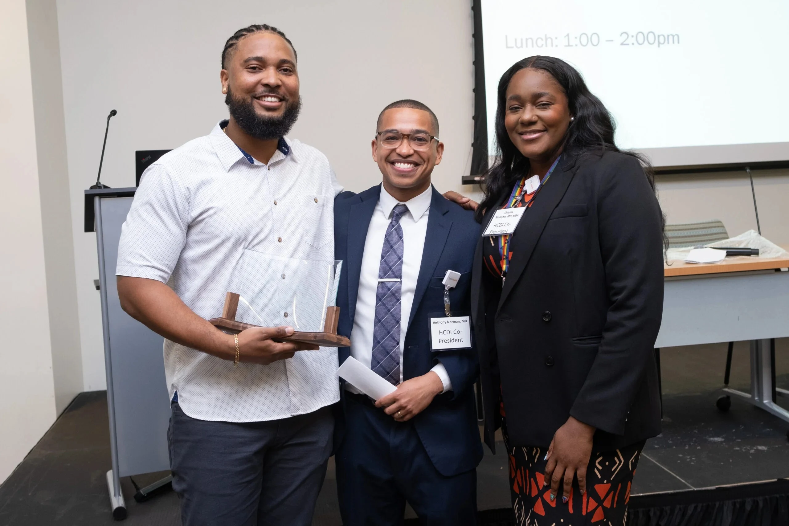 Mark Fleming II, MD (left) with HCDI Co-Presidents, Drs. Anothony Norman and Chioma Moneme.