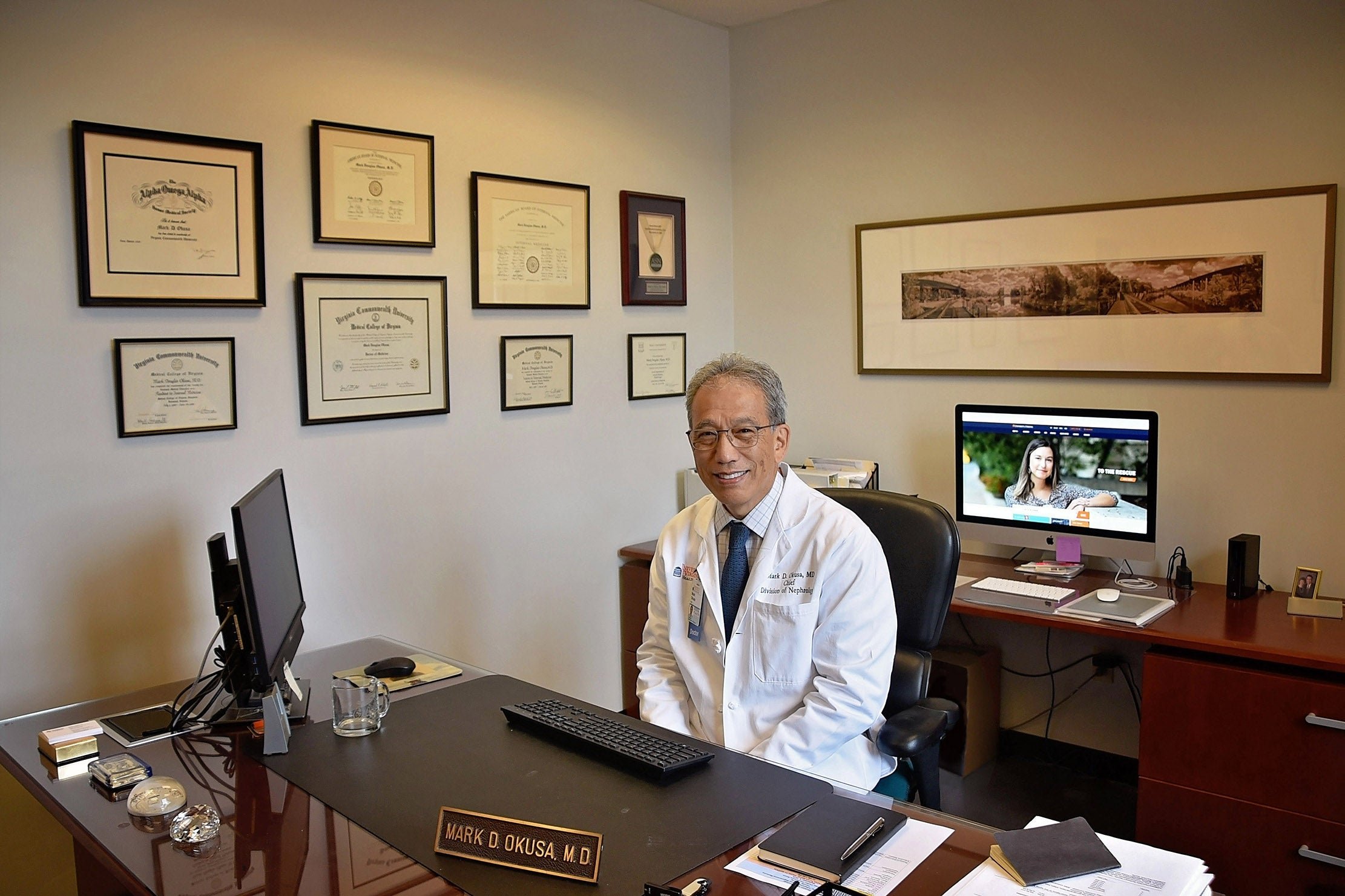 Professor Mark Okusa