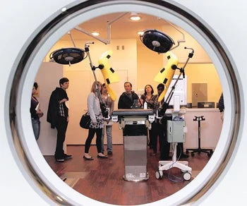 Students touring a medical procedure room
