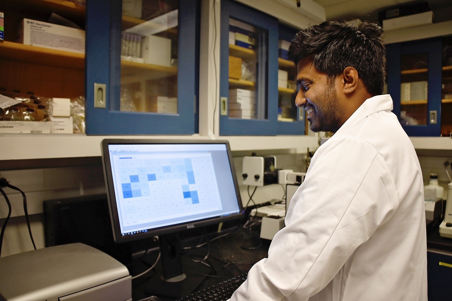 Lab member working in the lab
