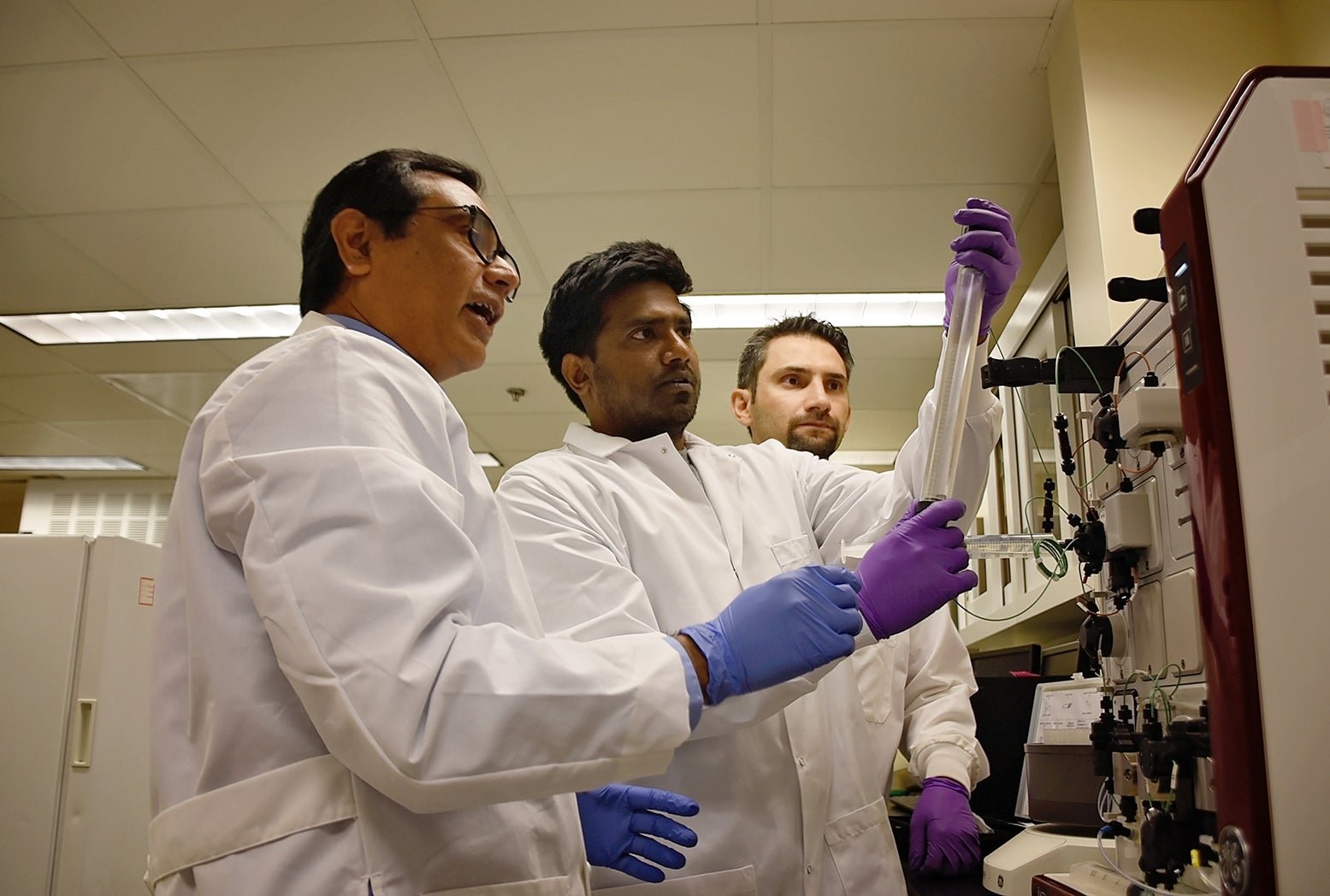 Lab members working in a lab
